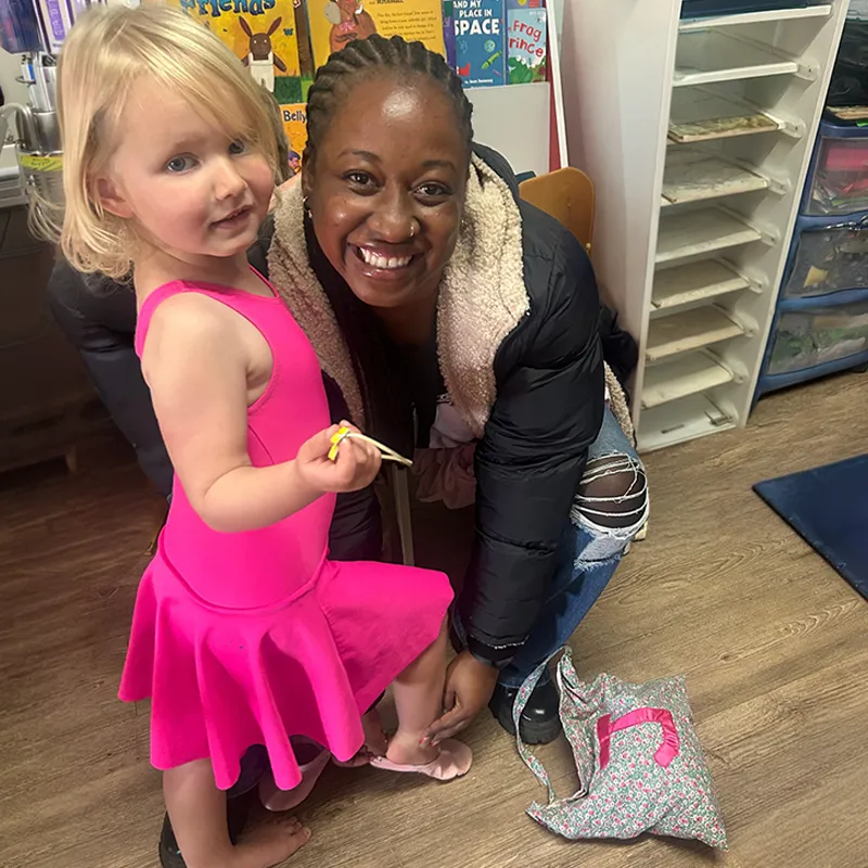 Ballet is one of several extra mural activities available at Bluebird, giving children the opportunity to explore their interests, build confidence, develop new skills and express themselves through movement and creativity. Teacher helping a young child prepare for ballet class during an extra mural activity at Bluebird Pre-Primary.