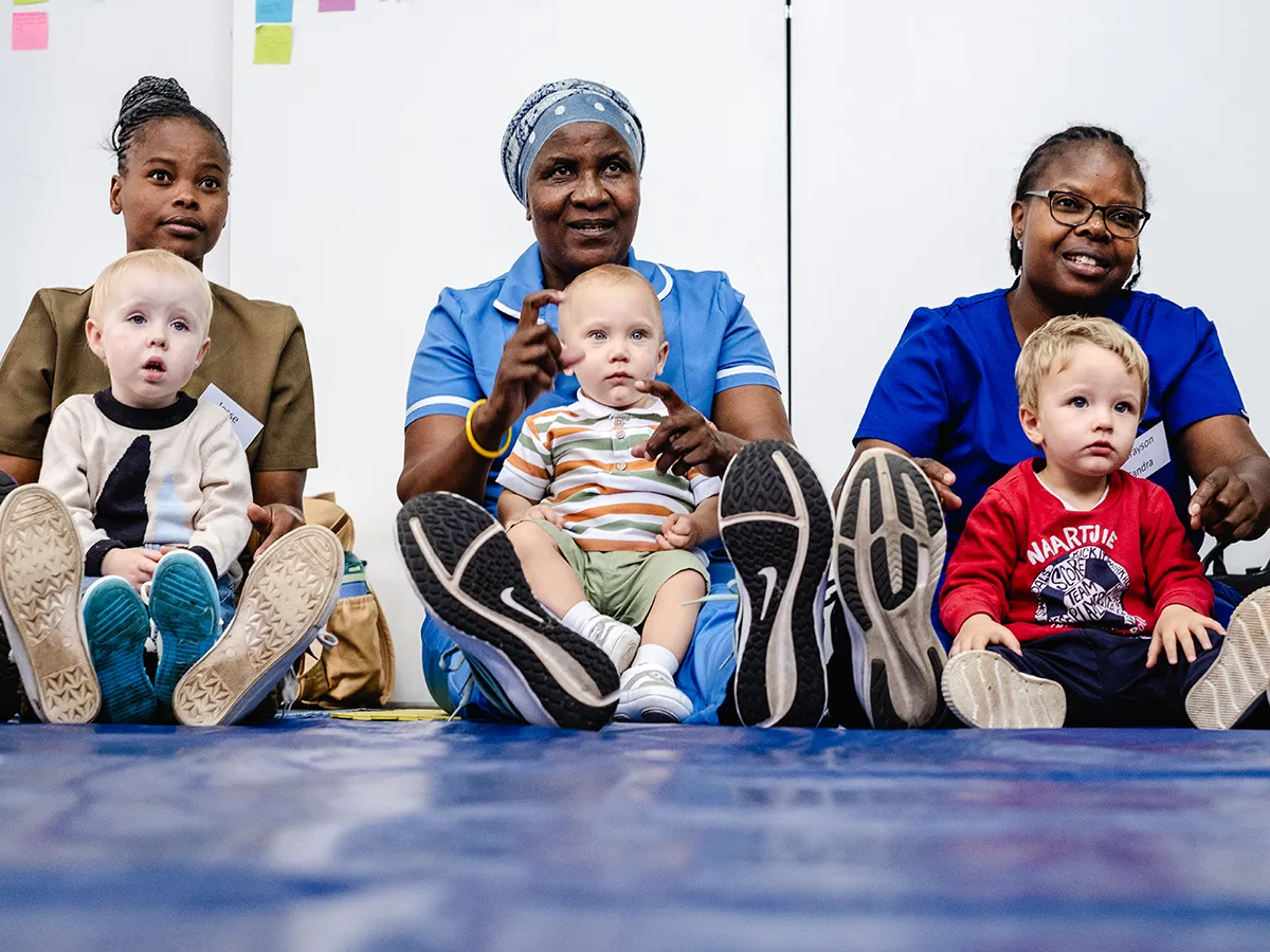 Our Early Birds programme creates a joyful space where toddlers and their parents or caregivers can learn, play and grow together through guided, age-appropriate activities. Toddlers and their parents or caregivers enjoying an interactive Early Birds session together at Bluebird Preschool.